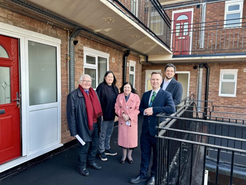 Tom with Cllr Barry Brotherton and the Sale Moor councillors at the opening of Brotherton Court