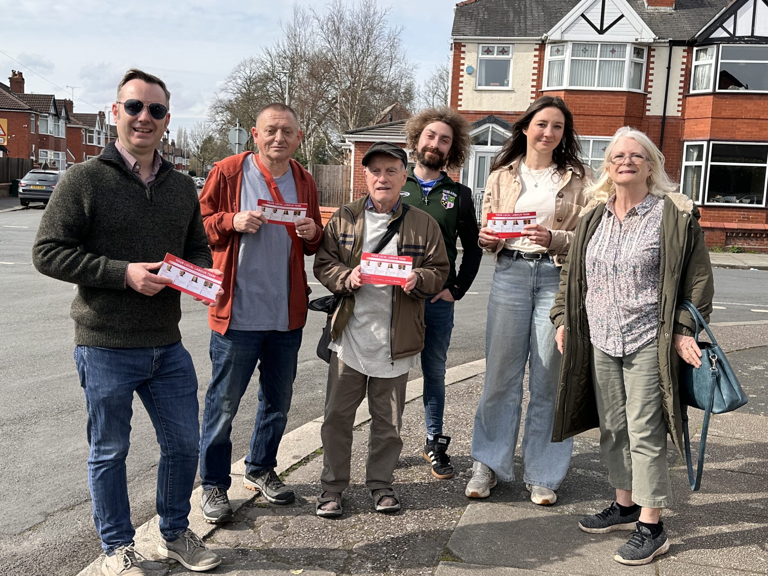Tom and colleagues on the doorstep in Stretford