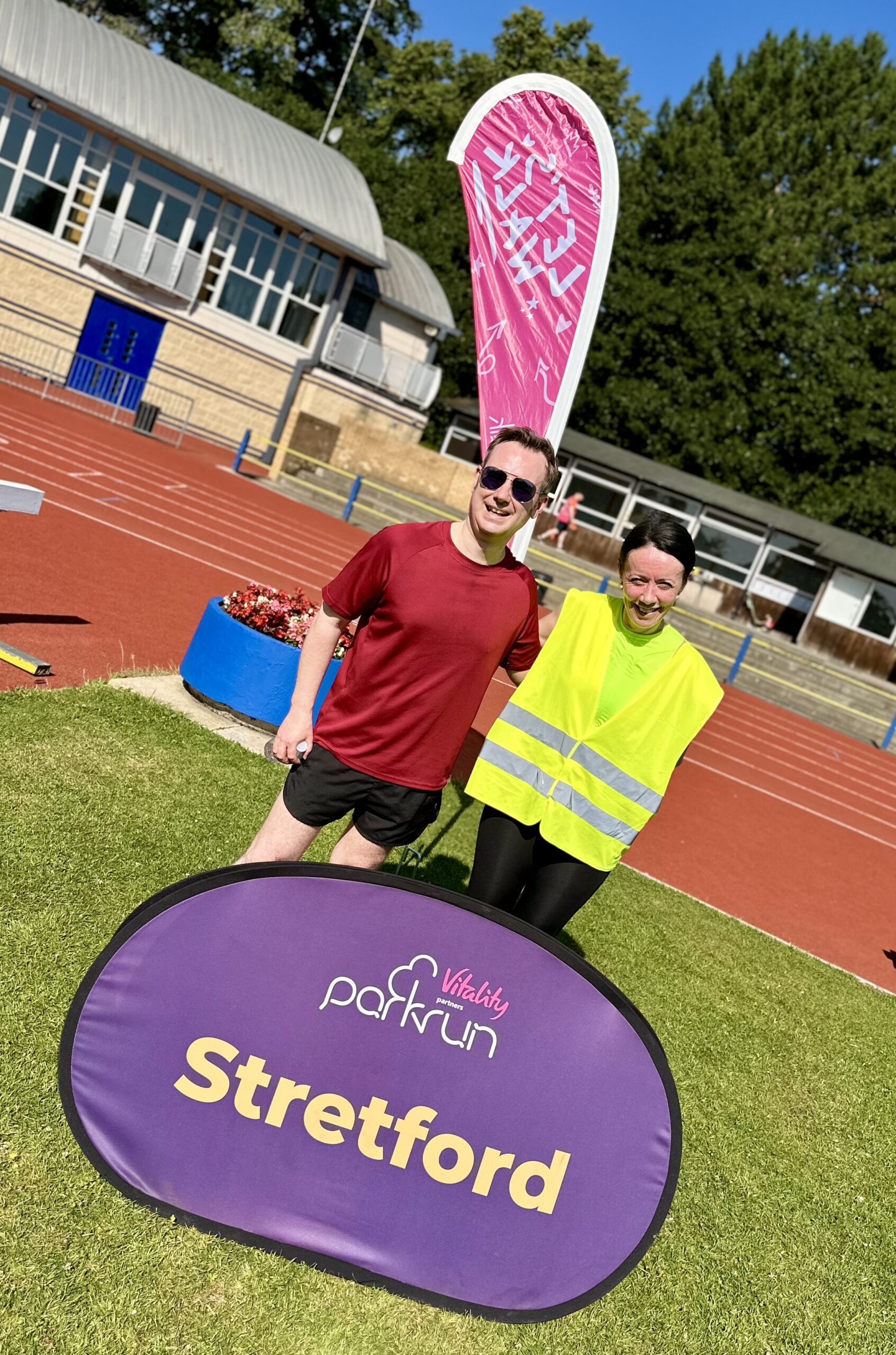 Tom with Miss Lynton from St Matthew's Primary School following Stretford Parkrun
