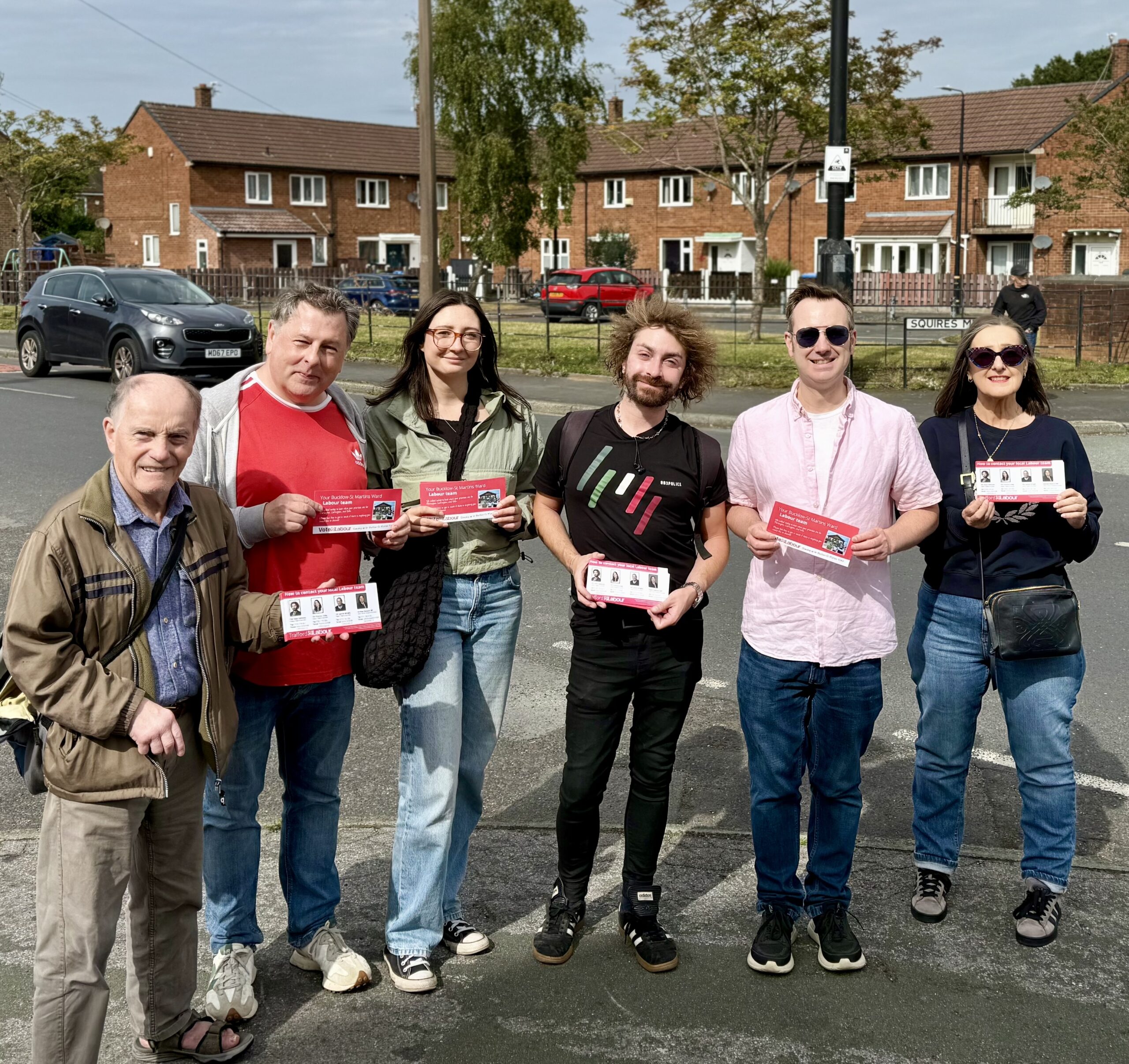 On the doorstep with colleagues in Partington